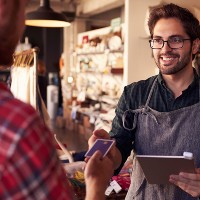 man taking payment from customer