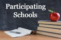 books on a desk with an apple on top and a chalkboard in the background that says participating schools