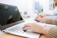 a student taking a test on a computer