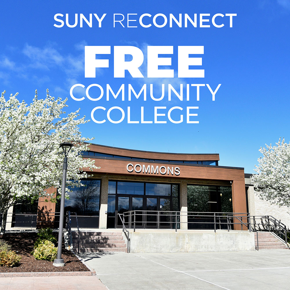 Commons building on a spring day with two white flowered trees on each side of the building in front of a bright blue sky. Text on top of image reads SUNY Reconnect Free Community College